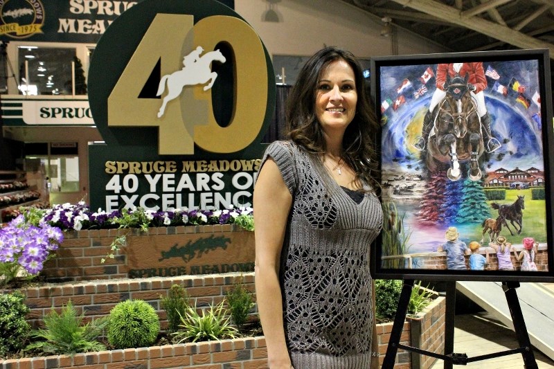 Michelle Pilon stands with her painting &#8220;Dedicated Dreams&#8221; that was selected for Spruce Meadows&#8217; 40th anniversary poster.