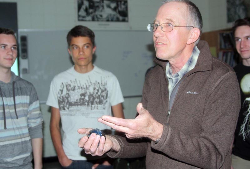 Oilfields High School teacher Chris Hughes holds a shock ball, which is used to show emotions during a stressful situation. The exercise is part of the international b.