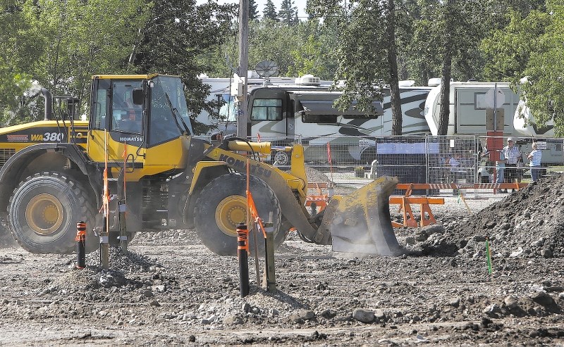 Construction crews work on re-establishing the north end of the Bob Lochhead Memorial Park campground in Black Diamond, which is expected to open later this summer.
