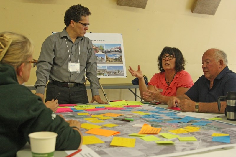02 Planning + Design senior planner Marcelo Figueira leads Black Diamond and Turner Valley residents in a discussion about growth during a public input workshop at the Flare