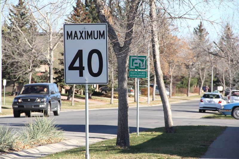 Woodhaven Drive has a posted speed limit of 40 kilometres per hour. The 40 km/hr limit will soon be in effect for all Okotoks residential streets unless otherwise posted.