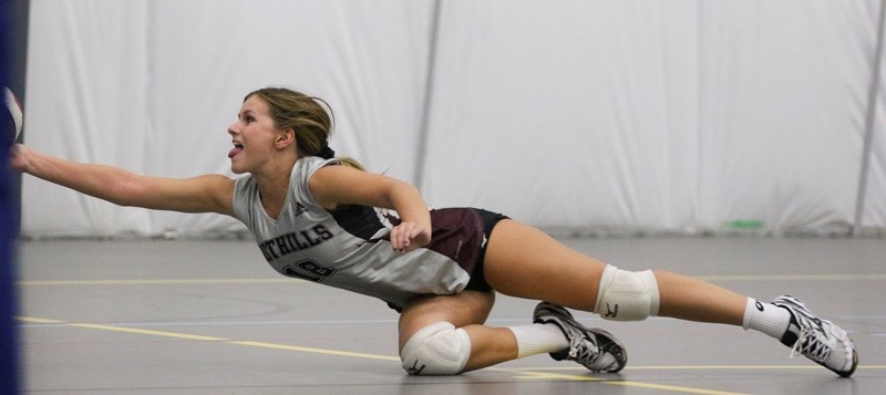 />Foothills Falcon libero Mikaela Reidlinger digs out a spike in the team&#8217;s victory over the Holy Trinity Academy Knights in the Foothills Athletic Council Senior girls 