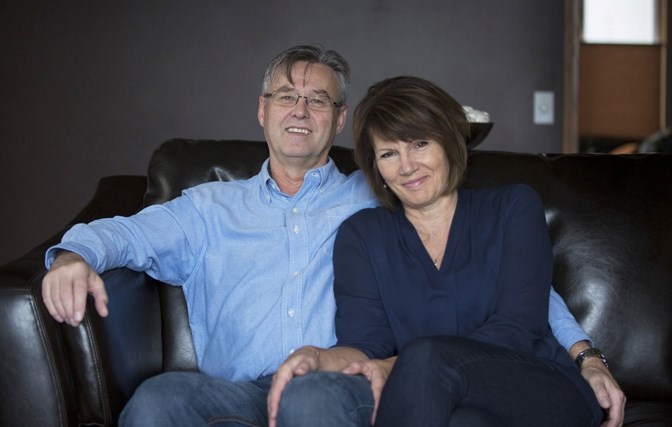 Prostate cancer survivor Merlin MacNaughton sits with his wife Linda in their Crystal Ridge home on Nov. 7.