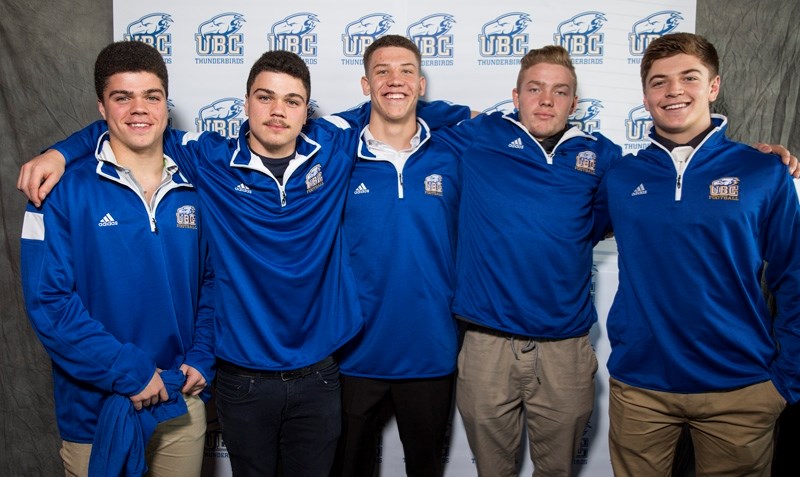 A quartet of Foothills area high school football players signed with the UBC Thunderbirds Friday. They are, from left, Priddis&#8217; Michael and Christian Sherman, Foothills 