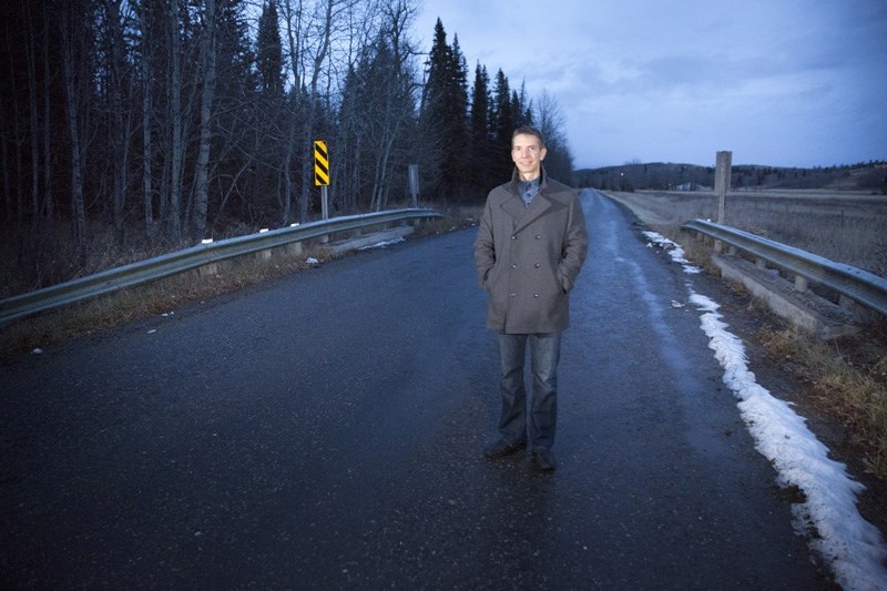 MD of Foothills Division 3 councillor Jason Parker stands on a small bridge on Home Oil Road west of Millarville. The MD hopes to tap into renewed provincial funding to