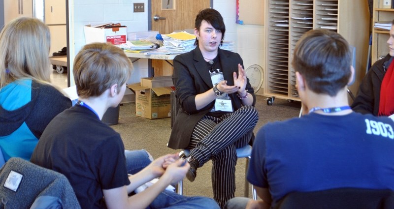 James Benedetti, a 20-year-old transgender Foothills Composite graduate, speaks to students at the Oilfields High School Human Library. He is in favour of the guidelines