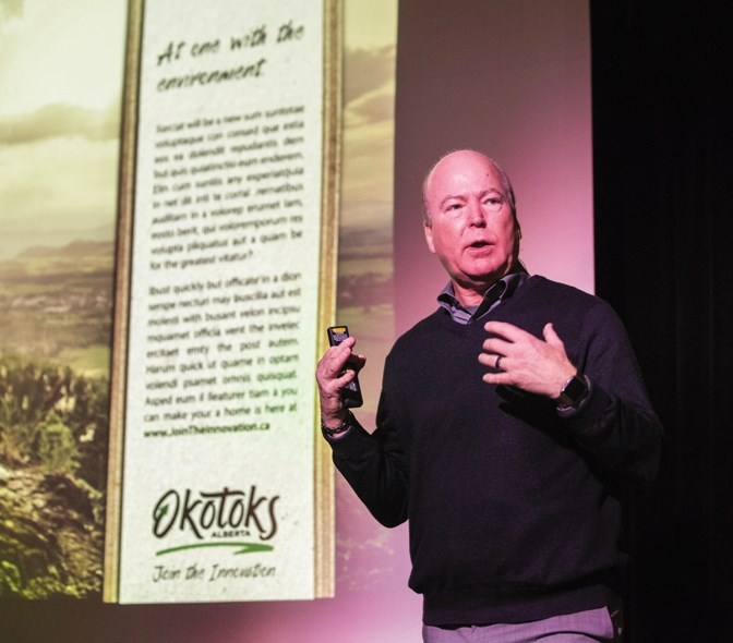 Roger Brooks speaks to a crowd of about 150 people at the Rotary Performing Arts Centre on Jan. 15. Brooks revealed a new proposed brand for Okotoks: &#8220;At the