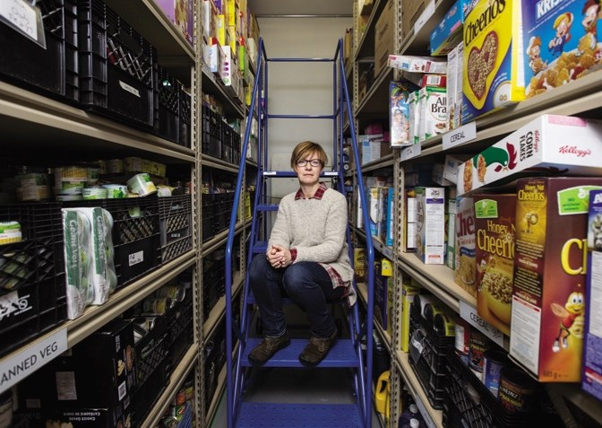 Sheila Hughes at the Okotoks Food Bank Association on Jan. 15. While the holiday season is over, the need for food donations isn&#8217;t – the community continues to draw