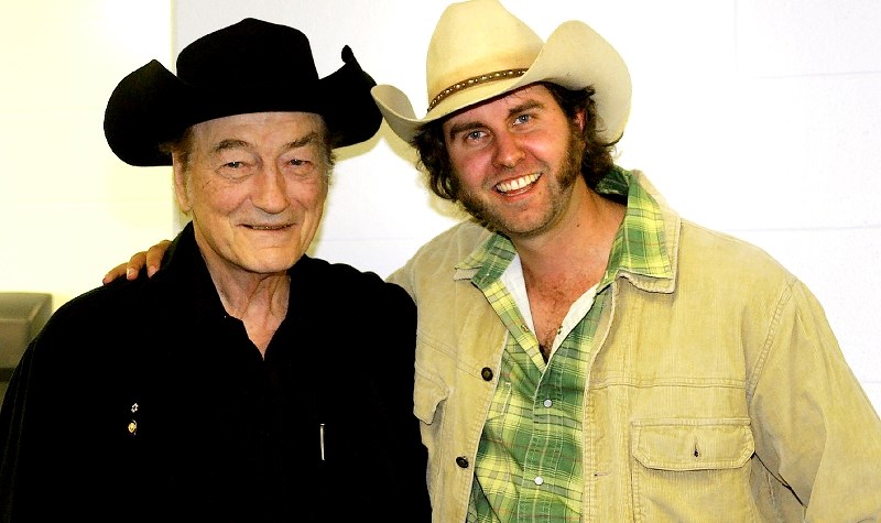 Sundre musician Tim Hus, right, pictured here with Stompin&#8217; Tom Connors, will pay tribute to Connors in the All Canadian Birthday Show at The Stop Coffee House and