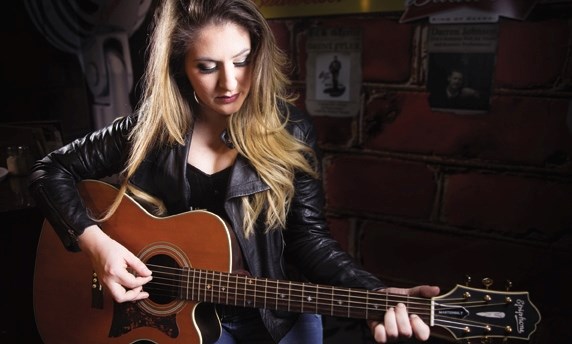 Okotoks country singer Michela Sheedy is a finalist in the Country 105 Lammle&#8217; s Rising Star Talent Search. Sheedy will compete against five other Calgary-area singers