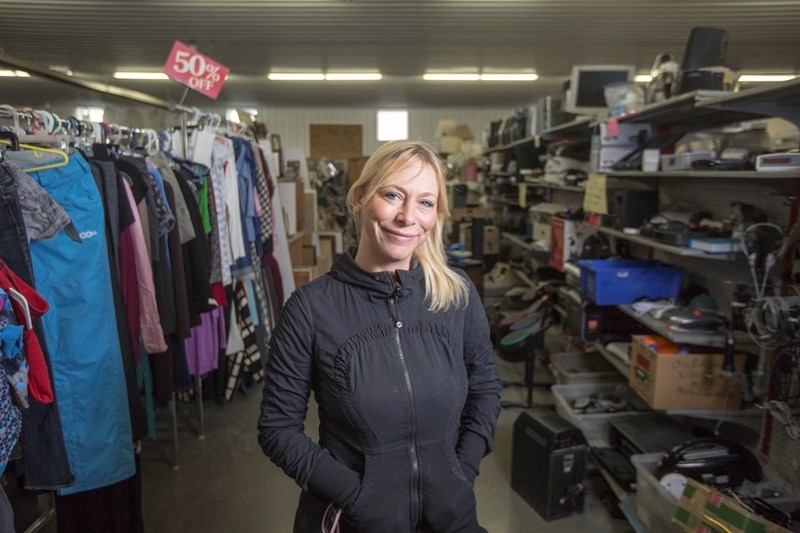 Okotoks Salvage Centre manager Candice Dupre on Apr. 5. While the Salvage Centre charges for the donated items, it gives surplus revenue back to various local charities.