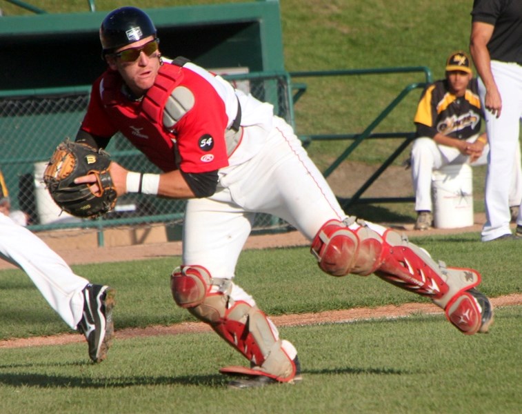 Jordan Procyshen, here making a throw to first base with the Okotoks Dawgs, started his second full-season of pro ball with the Salem Red Sox last week. Wheel file photo