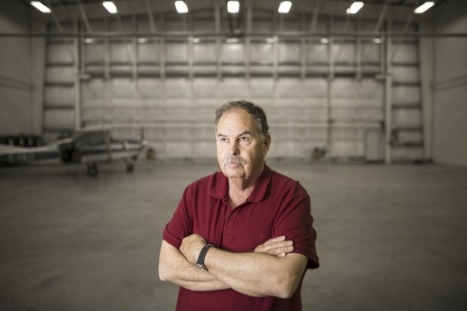 Pat Gropp, owner of GeodesyGroup Inc, in his hangar at the Okotoks Air Ranch Airport. Gropps is being forced to move his operations to the High River Airport due to a