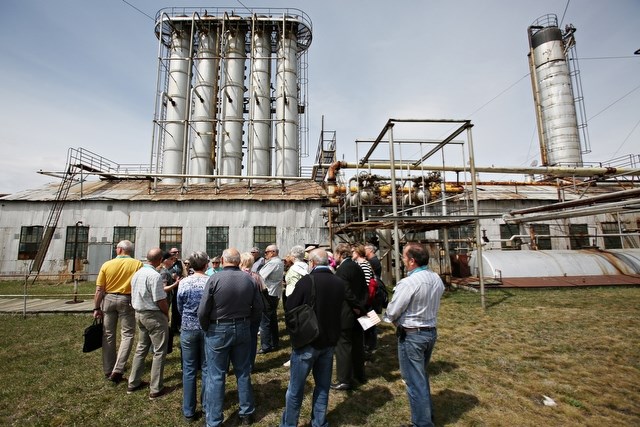 A group of people tour the Turner Valley Gas Plant in the spring of 2014. This summer&#8217; s tours brought almost 800 people through the provincial historic site from the