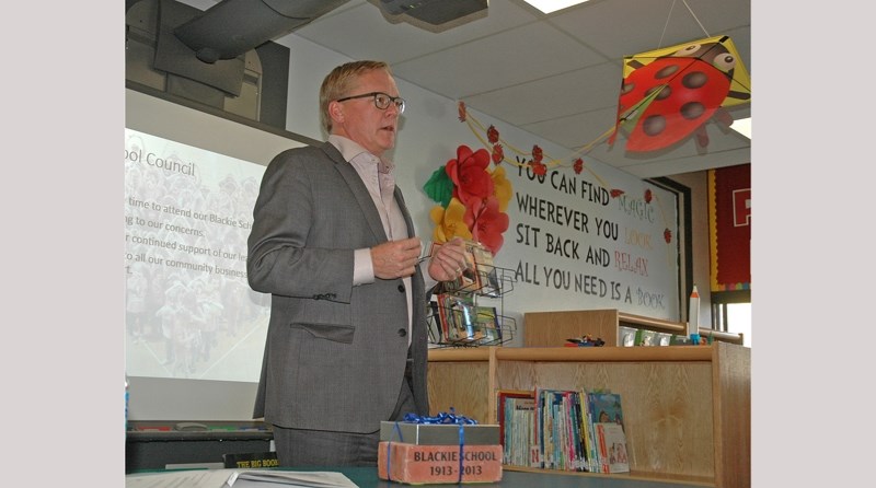Alberta Education minister David Eggen speaks to the Blackie School parent council on Sept. 9.