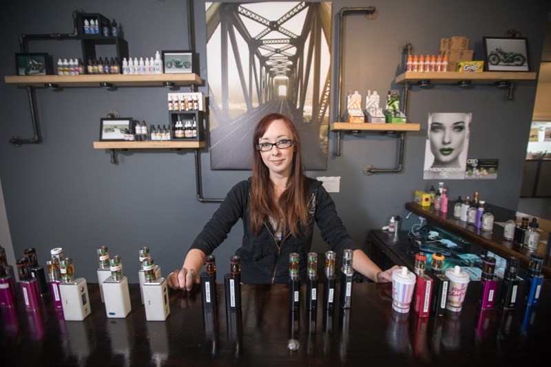 Kathleen Hurtak, manager of Dieslelpunk Vape Co. behind the counter on Oct. 8. Hurtak said she&#8217;s pleased to see regulations come into play but hopes they aren&#8217;t