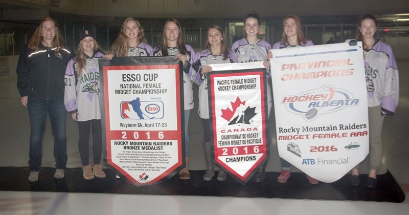 Graduating members from the 2015-16 Rocky Mountain AAA Raiders brought out their three championship banners for the team&#8217; s home opener on Oct. 9 at the Scott Seaman