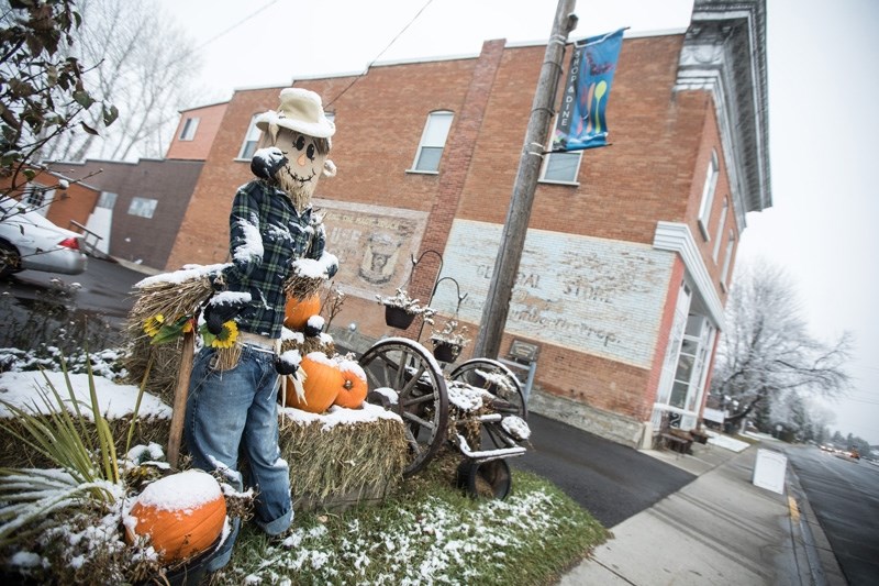 A scarecrow watches over the parking lot of Rumpled Quilt Skins on Oct. 18 as part of a contest intended to draw visitors to the WFG Masters to Olde Towne area businesses.