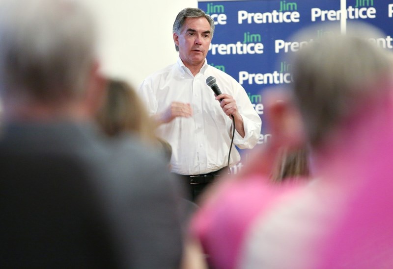 Former Alberta premier speaks to a crowd in Okotoks during the 2015 election campaign. Prentice was killed in a plane crash Oct. 14.