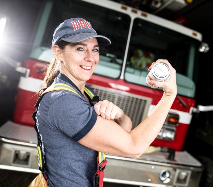 Firefighters from Black Diamond, Turner Valley and Longview, such as Jamie Kline, above, will be knocking on doors for the Oilfields Food Bank&#8217;s food drive on the