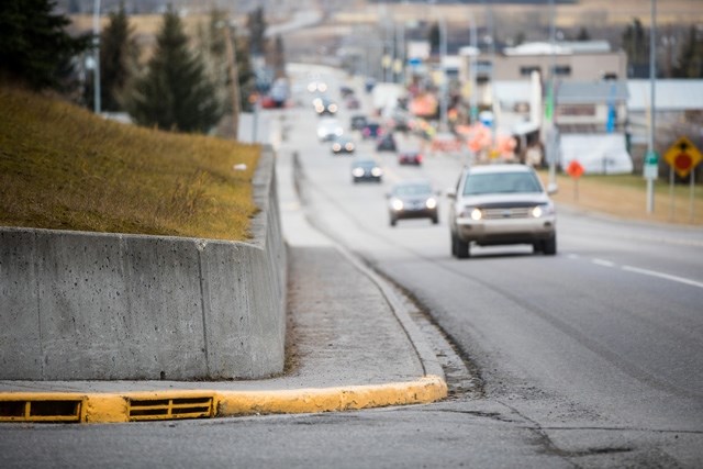 A retaining wall at the intersection of Highway 7 and 3rd Street SE are among the safety issues Black Diamond Town council wants addressed by an engineer.