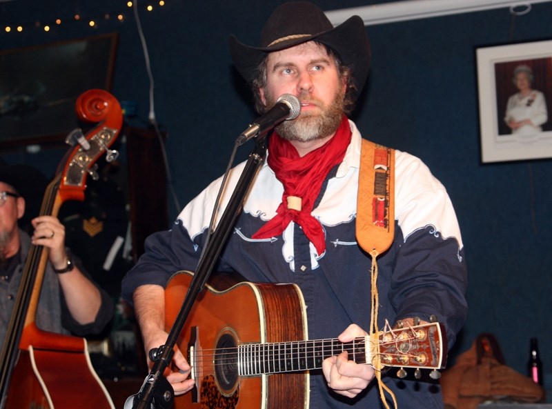 Old-style country singer Tim Hus entertained a sold-out crowd at the Turner Valley Royal Canadian Legion on Feb. 4 to raise funds for Chad Kendrick who has been diagnosed