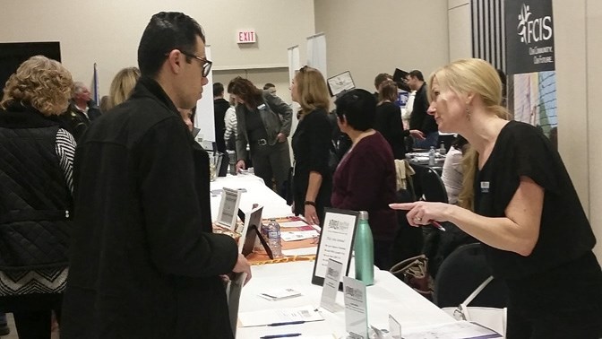 Nader Khazaal chats about potential opporunties at The Brtitsh Chippy during the McBride Career Group Career Expo on March 2.