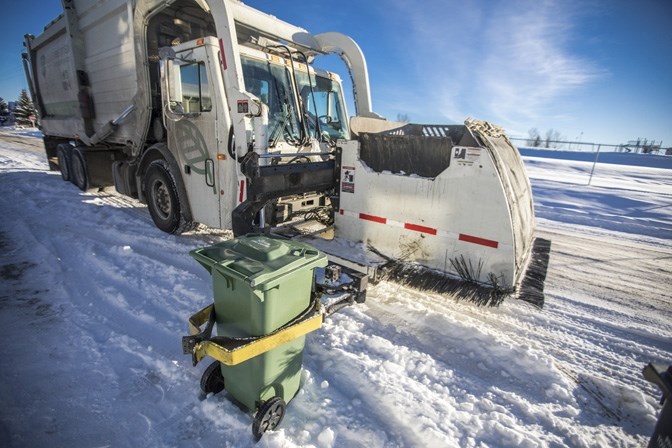 The Town of Okotoks says changes to curbside waste collection made in fall 2016, such as expanding curbside recycling collection and adding green bins (pictured), have
