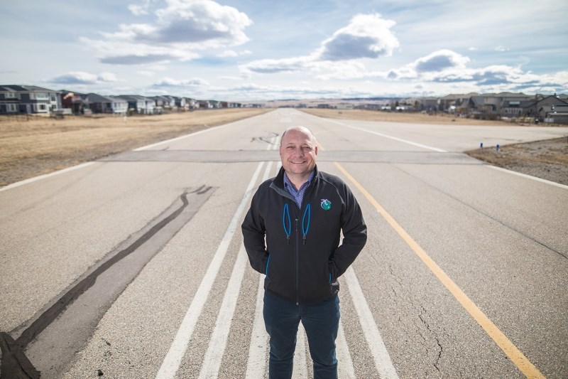 Okotoks Airport manager Trent Obrigewitsch on the tarmac on March 24. The airport is reopening on April 30 after being closed for a year.