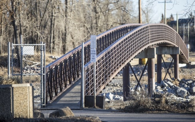The Laurie Boyd Bridge, at the Okotoks Public Library, will be replaced with a new, wider bridge in 2018.