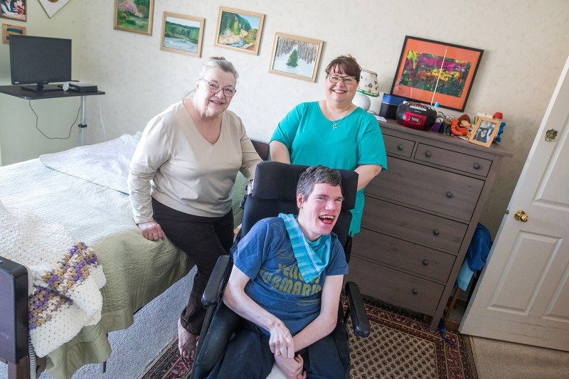 Brent Calver/OWW Nick Murphy with his adoptive mother, Faye Gosselin and caregiver Stacy Schmaltz-Knox on March 28.