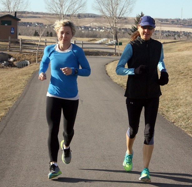 Okotoks area runners Niki Doyle, left, and Lori Toombs will run the famed Boston Marathon on April 17.