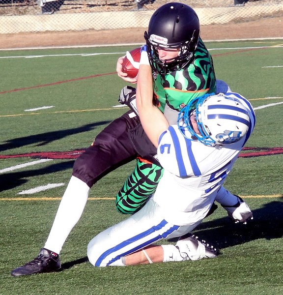 Quarterback Robbie Hoffman has guided the Big Rock Bengals to a 3-0 record at the midway point of the Calgary and Area Midget Football Association schedule.