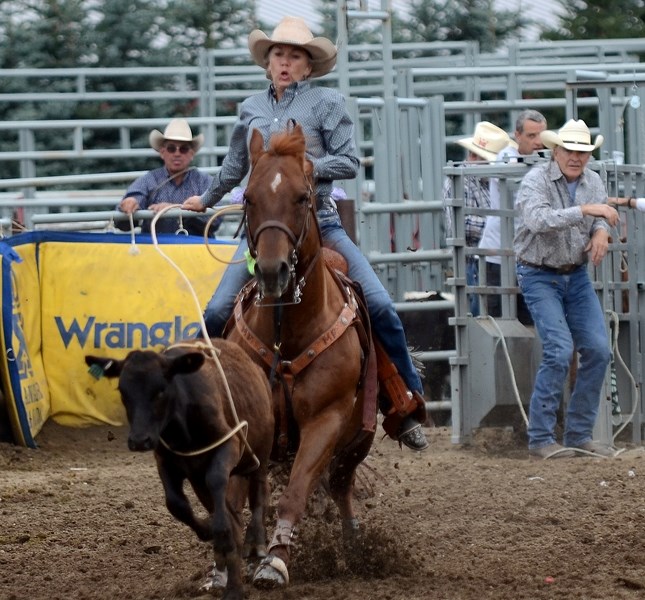 Margo FitzPatrick ropes a calf in the breakaway competition at a senior rodeo in Nanton in 2016