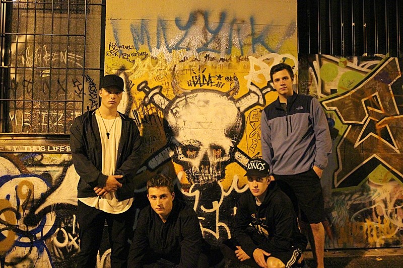 Left to right, Okotoks Oilers Kylor Wall, Carter Huber, Tanner Laderoute and Kyle Gordon in an alley in Vancouver&#8217; s Downtown Eastside Aug. 31 during a tour of the area 