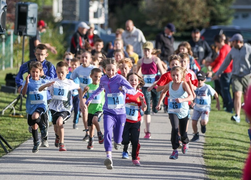 Junior runners take off in the kid&#8217;s 2k run at the Sheep River Road Race in 2016. This year&#8217;s race is on Sept. 16.
