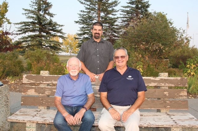 Clockwise from back, Councillor Barry Crane, Gerald Pfeil and John Waring are running for another term on Turner Valley Town council. Elections take place Oct. 16.