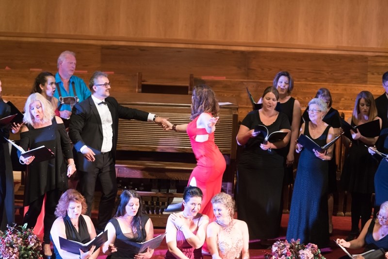 Members of the Calgary Concert Opera Company perform with the Foothills Philharmonic Opera Chorus at the Okotoks United Church last year. They return Sept. 24 with symphony