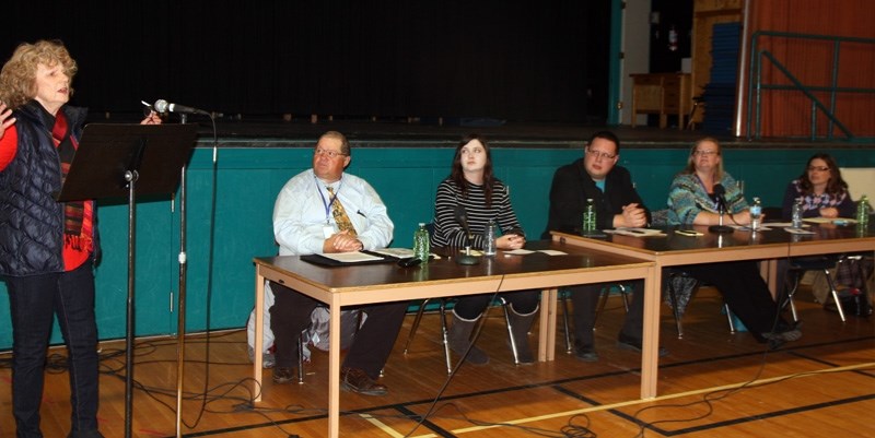 Candidate Vivienne Nicol addresses the approximately 25 people at the Foothills School Division Ward 2 Foothills School Division trustee candidates forum on Oct. 11 at