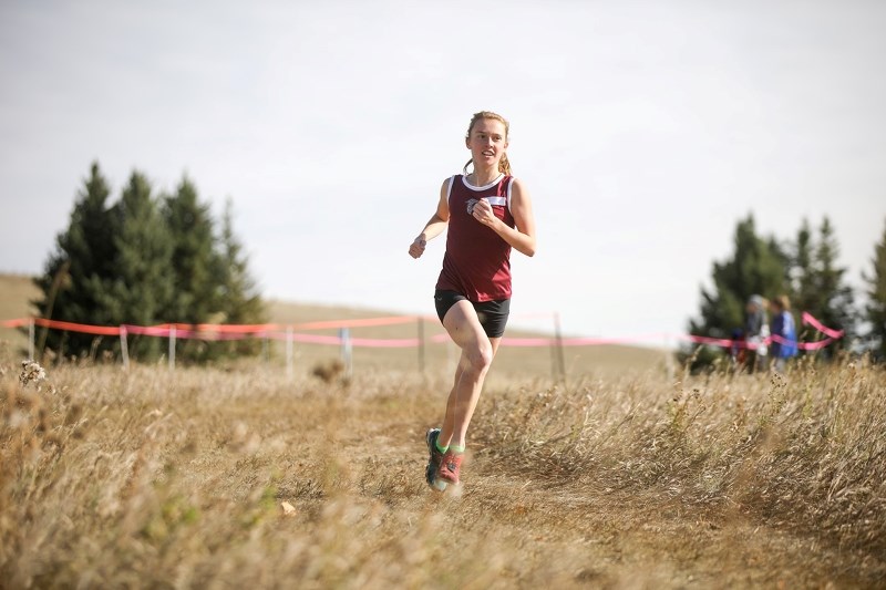 Foothills Falcon Rosie Bouchard, here running at Red Deer Lake, won the Intermediate girls South Central cross-country championship in Sundre on Oct. 11.