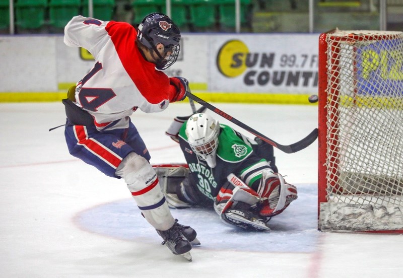 Okotoks Bow Mark Oilers goaltender Hunter Young stretches out for a breakaway save during the team&#8217; s 4-1 victory over the CAC Gregg Distributor Canadians on Oct. 14 at 