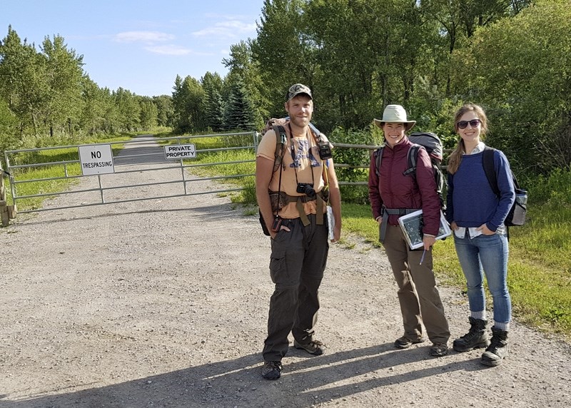 Ashley Herriman with the Foothills Land Trust at a site near the Highwood River with two biologists from Cows and Fish on the first day of a Highwood River Riparian Project