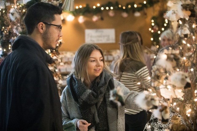 Rebecca Maloney and Jeff Buchanan browse at last year&#8217; s Millarville Christmas Market. The market will be open Nov. 9-12 as part of the Foothills Holiday Roadshow.