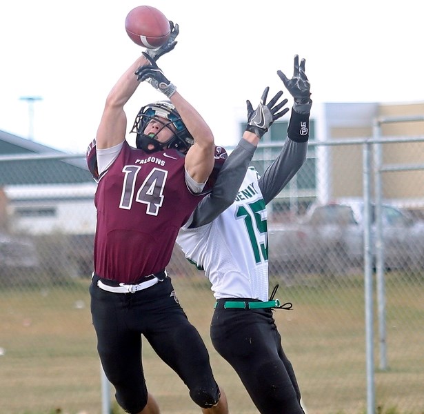 Foothills Falcon Seth Nelson breaks up a pass during the 2016 provincial playoffs.