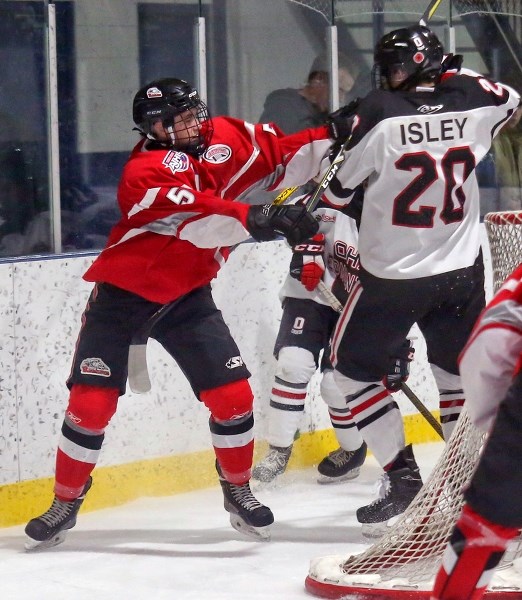 Rockyview Raiders defenceman Alex Frank jousts with an OHA Edmonton forward during the 2017 Prospect Cup, Nov. 11 at the Chestermere Recreation Centre.
