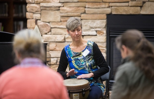 Laura Lagendyk facilitates the drum circle at the Sheep River Library. The library recently purchased 20 of its own drums after receiving funds from the Friends of the Sheep