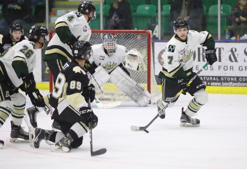 Okotoks Oilers defenceman Nick Blankenburg rushes the puck out of the defensive zone during the 3-2 victory over the Bonnyville Pontiacs, Nov. 24 at Pason Centennial Arena.