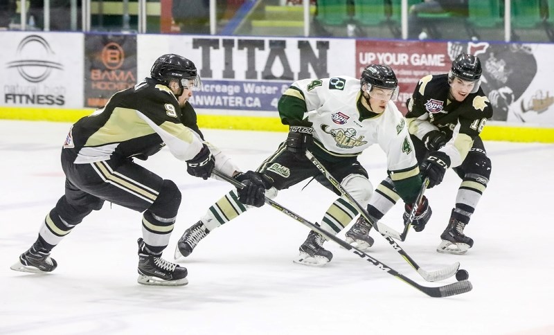 Okotoks Oilers Dylan Holloway rushes the puck out of the defensive zone during the 3-2 victory over the Bonnyville Pontiacs, Nov. 24 at Pason Centennial Arena.