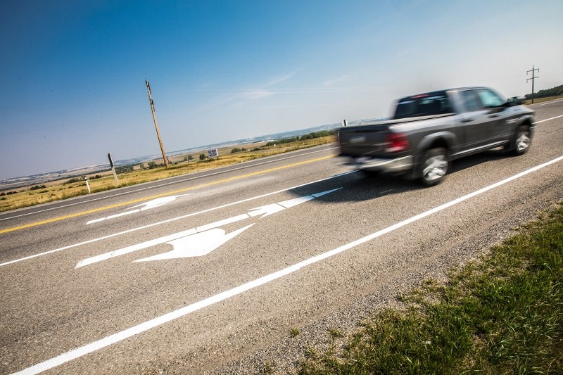 Foothills residents say lines painted on Highway 7 at Big Rock Trail / 16 Street W aren&#8217;t enough. The Province is now looking into lights or speed reduction at the busy 