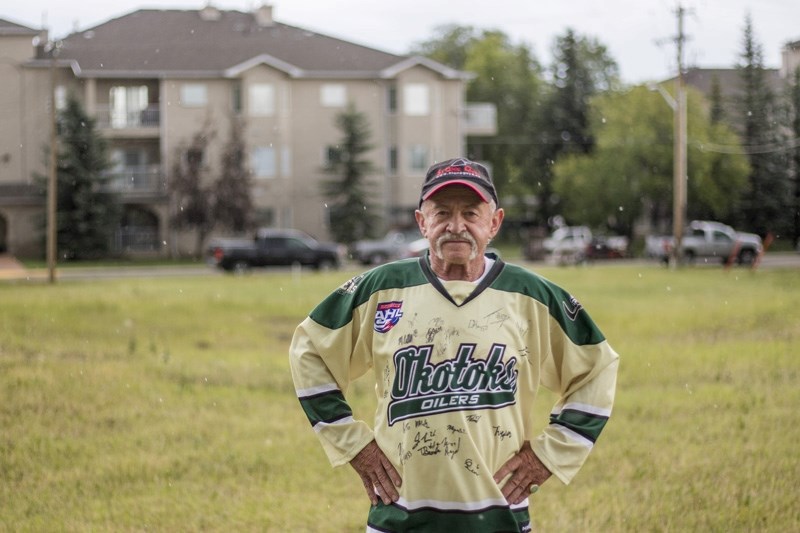 Okotoks resident Gordon White stands beside the site of a proposed 32-unit multi-family complex.The Alberta Court of Appeal is set to rule on a case launched by White against 